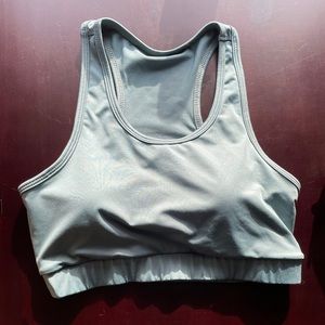 Teal sports bra with cute straps in the back